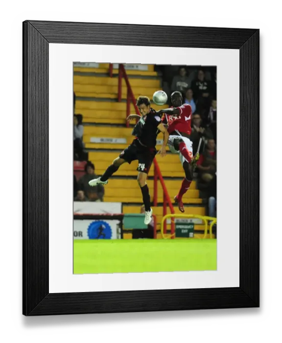 Framed Print : Bristol City vs Swindon Town: Albert Adomah vs Jonathan Smith Battle in 2011 League Cup Match Framed Print : Bristol City vs Swindon Town: Albert Adomah vs Jonathan Smith Battle in 2011 League Cup Match