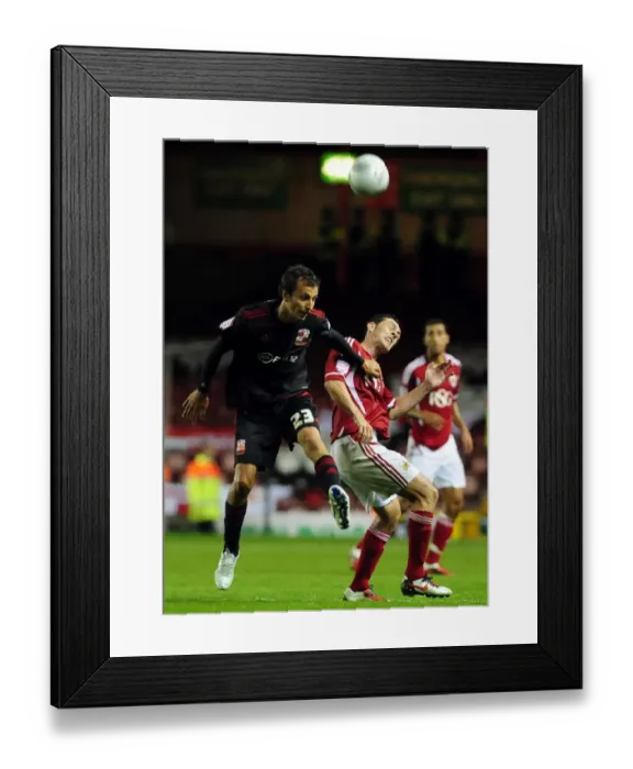 Framed Print : Bristol City vs Swindon Town: Raffaele De Vita vs Jamie McAllister Battle in the 2011 League Cup