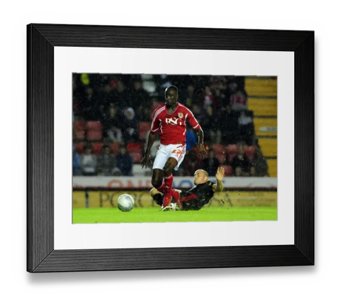 Framed Print : Bristol City's Albert Adomah Fouled by Swindon Town's Alan McCormack - League Cup Clash, 2011 Framed Print : Bristol City's Albert Adomah Fouled by Swindon Town's Alan McCormack - League Cup Clash, 2011