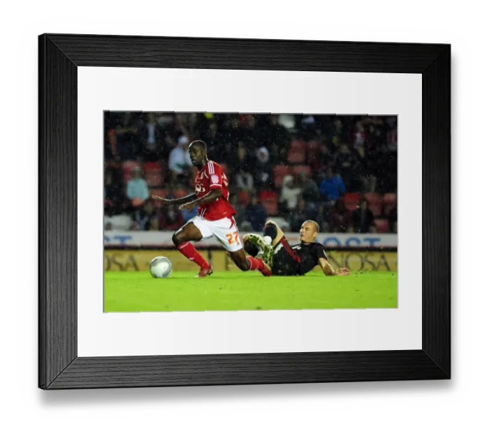 Framed Print : Bristol City's Albert Adomah Foul by Swindon Town's Alan McCormack - League Cup Clash (August 2011)