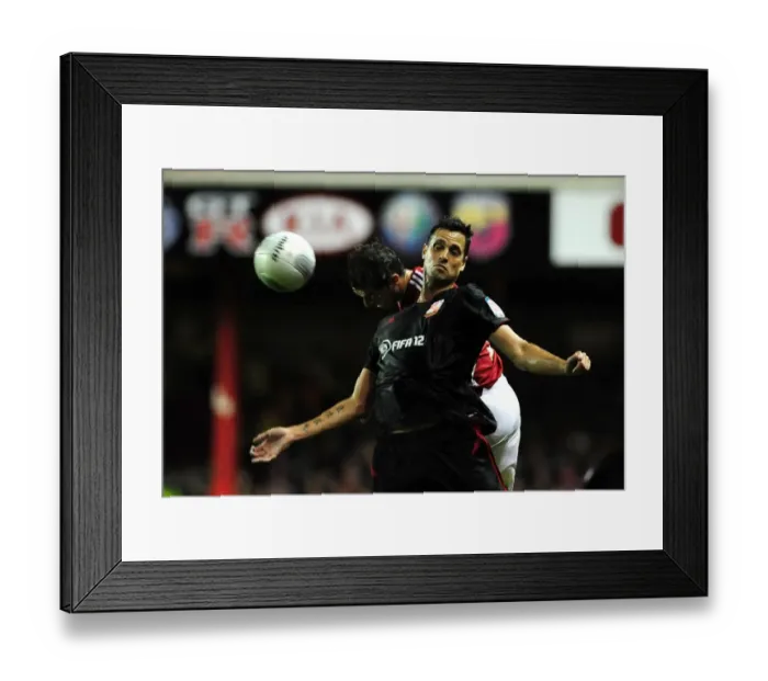 Framed Print : Battling for the High Ball: McAllister vs. Magera in the 2011 League Cup Clash (Bristol City vs. Swindon Town) Framed Print : Battling for the High Ball: McAllister vs. Magera in the 2011 League Cup Clash (Bristol City vs. Swindon Town)