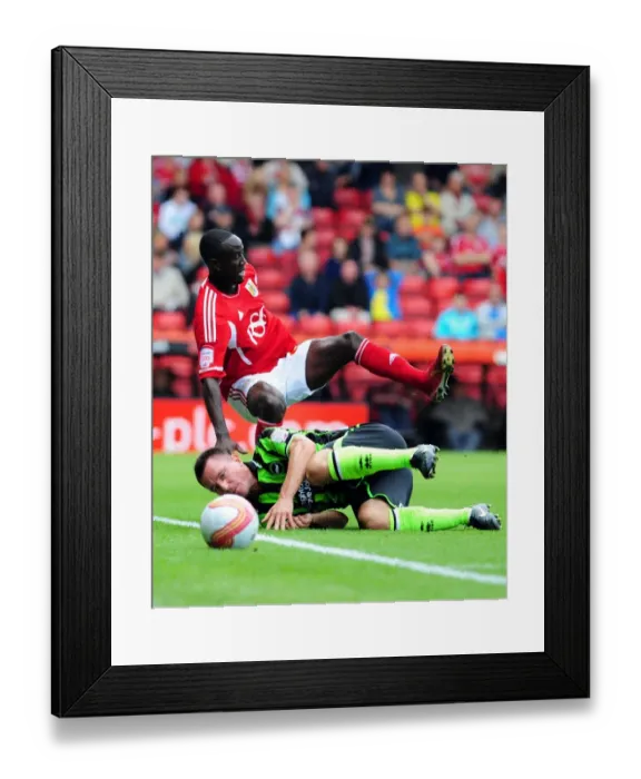 Framed Print : Bristol City's Albert Adomah Fouls by Marcos Painter in Championship Match vs. Brighton (10-09-2011) Framed Print : Bristol City's Albert Adomah Fouls by Marcos Painter in Championship Match vs. Brighton (10-09-2011)