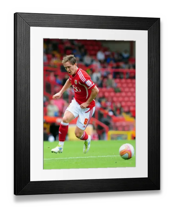 Framed Print : Bristol City vs Brighton: Neil Kilkenny in Championship Action at Ashton Gate Stadium (September 10, 2011)