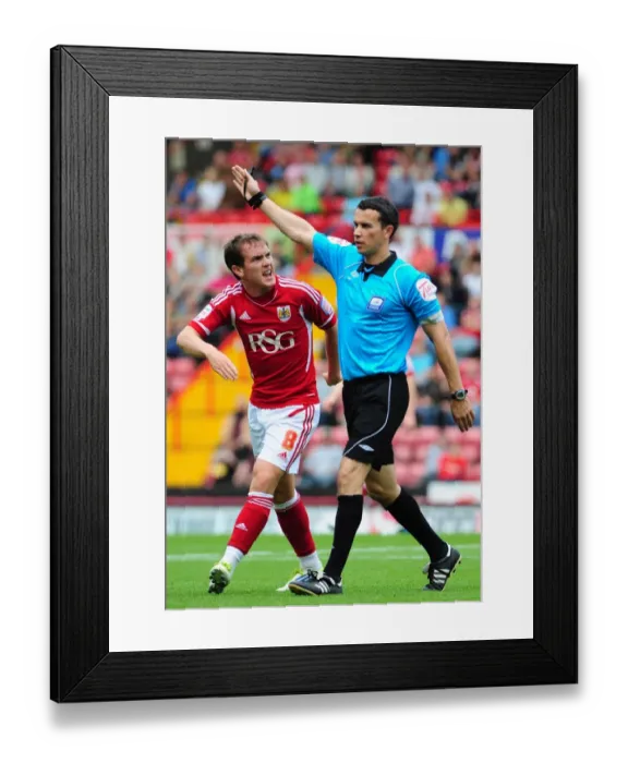 Framed Print : Bristol City's Neil Kilkenny Argues with Referee during Championship Match against Brighton (10-09-2011) Framed Print : Bristol City's Neil Kilkenny Argues with Referee during Championship Match against Brighton (10-09-2011)