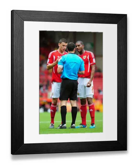 Framed Print : Bristol City's James Wilson Booked in Championship Clash vs. Brighton (September 10, 2011) Framed Print : Bristol City's James Wilson Booked in Championship Clash vs. Brighton (September 10, 2011)