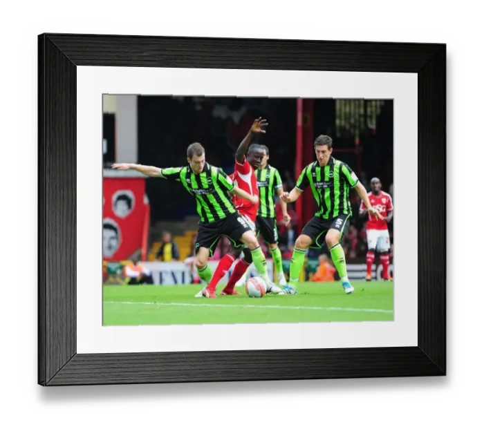 Framed Print : Bristol City vs Brighton: Albert Adomah Fights for Possession against Ashley Barnes and Lewis Dunk (Championship Match, 10-09-2011)