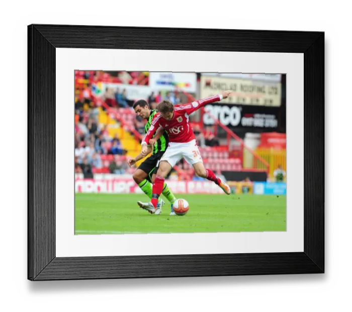 Framed Print : Bristol City's Brett Pitman vs Marcos Painter: Championship Battle at Ashton Gate, September 10, 2011 Framed Print : Bristol City's Brett Pitman vs Marcos Painter: Championship Battle at Ashton Gate, September 10, 2011