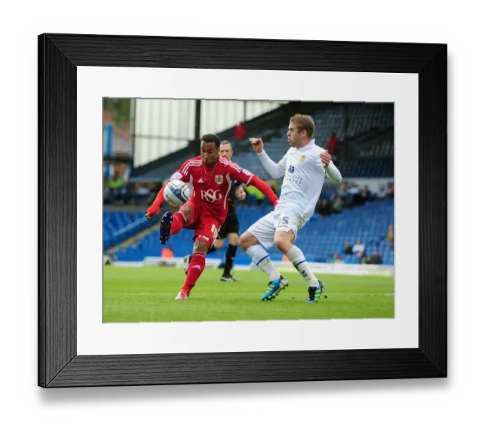 Framed Print : Nicky Maynard Flips Over Leeds Adam Clayton in League Cup Clash: Bristol City vs. Leeds United (16th September 2011) Framed Print : Nicky Maynard Flips Over Leeds Adam Clayton in League Cup Clash: Bristol City vs. Leeds United (16th September 2011)