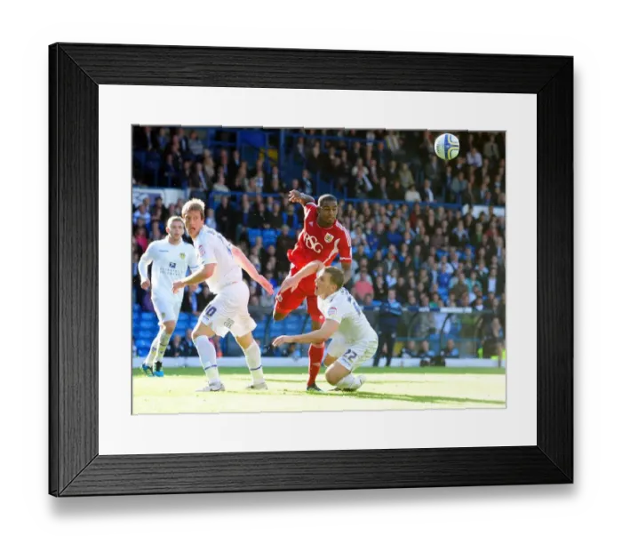 Framed Print : Intense League Cup Showdown: Marvin Elliott vs. Becchio and Somma (Leeds United vs. Bristol City)