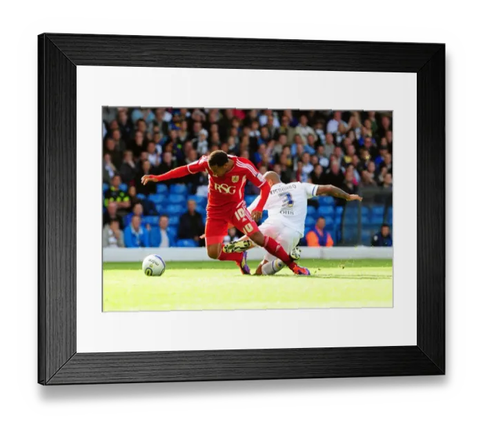 Framed Print : Leeds Kisnorbo Fouls Maynard, Gets Red Card in Leeds United vs. Bristol City League Cup Match - 16 / 09 / 2011