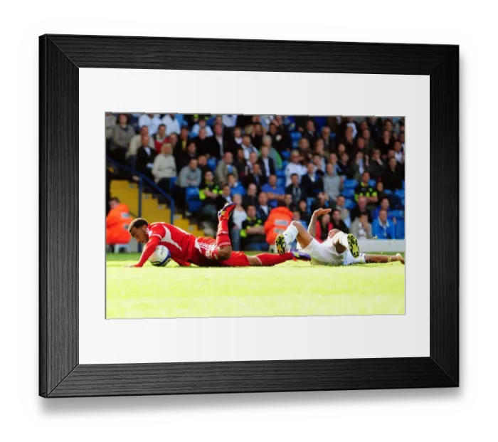 Framed Print : Leeds Kisnorbo Fouls Maynard, Red Carded in Penalty-Granting Clash at Elland Road (Leeds United v Bristol City, League Cup, 16th September 2011)