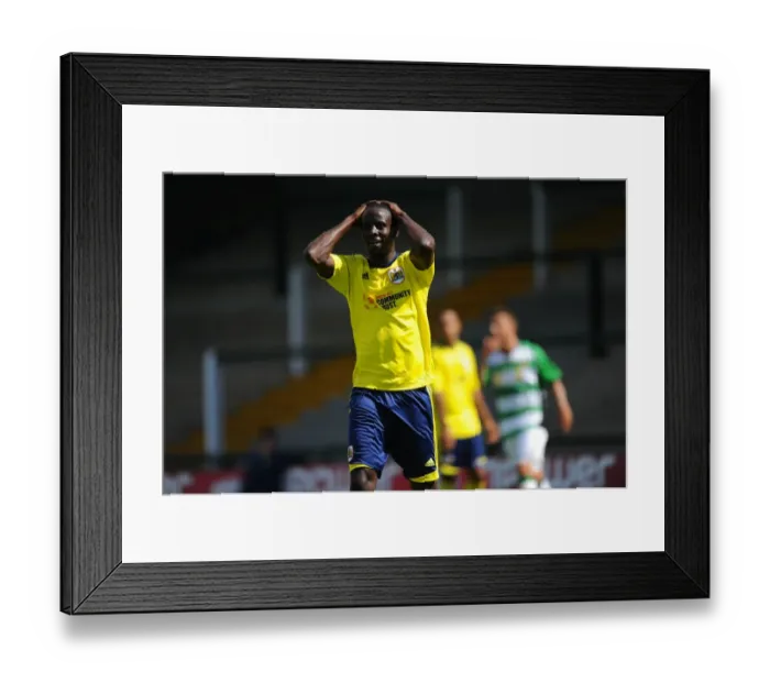 Framed Print : Bristol City's Albert Adomah Regrets Missed Opportunity in Pre-Season Friendly against Yeovil Town at Huish Park
