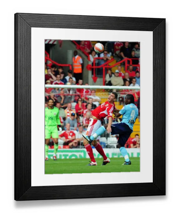 Framed Print : Bristol City's James Wilson Fouled by Hull City's Aaron Mclean in Championship Match, September 2011 - Editorial Use Only Framed Print : Bristol City's James Wilson Fouled by Hull City's Aaron Mclean in Championship Match, September 2011 - Editorial Use Only