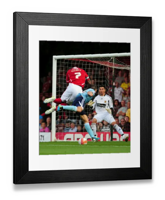 Framed Print : Bristol City's Marvin Elliott Heads Over: Championship Clash Between Bristol City and Hull City, 24 / 09 / 2011 Framed Print : Bristol City's Marvin Elliott Heads Over: Championship Clash Between Bristol City and Hull City, 24 / 09 / 2011