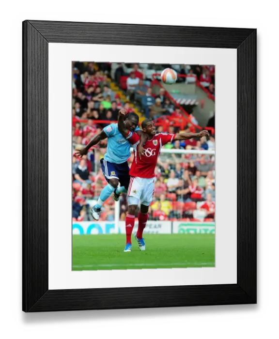 Framed Print : Bristol City vs Hull City: Marvin Elliott vs Aaron Mclean Battle in Championship Match, September 2011 Framed Print : Bristol City vs Hull City: Marvin Elliott vs Aaron Mclean Battle in Championship Match, September 2011