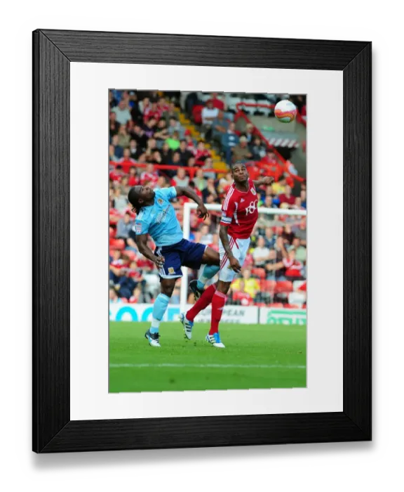 Framed Print : Championship Showdown: Marvin Elliott vs Aaron Mclean - Bristol City vs Hull City, September 2011: A Battle for Supremacy Framed Print : Championship Showdown: Marvin Elliott vs Aaron Mclean - Bristol City vs Hull City, September 2011: A Battle for Supremacy