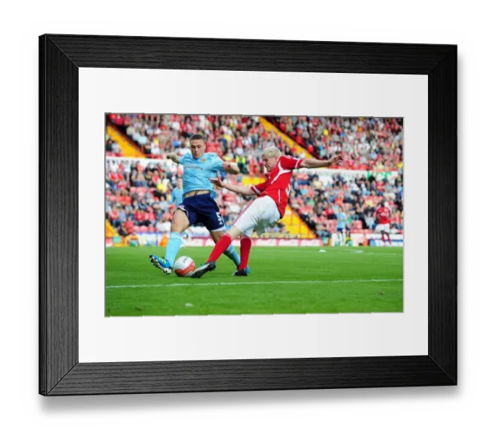 Framed Print : Ryan McGivern Crosses the Ball in Championship Match between Bristol City and Hull City at Ashton Gate Stadium (September 24, 2011) Framed Print : Ryan McGivern Crosses the Ball in Championship Match between Bristol City and Hull City at Ashton Gate Stadium (September 24, 2011)