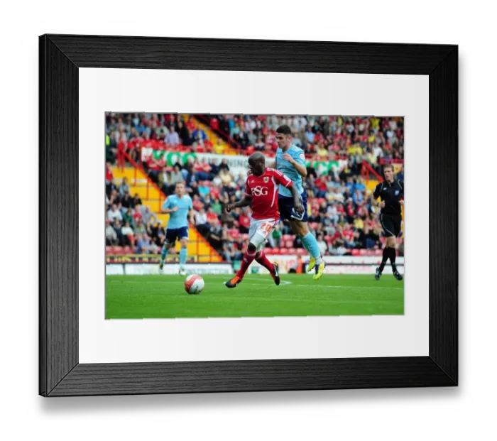 Framed Print : Bristol City vs Hull City: Jamal Campbell-Ryce vs Robert Brady Battle in Championship Match, September 2011
