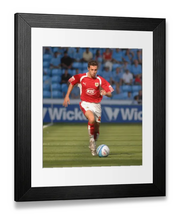 Framed Print : Ivan Sproule's Intense Midfield Battle: Coventry City vs. Bristol City - A Football Rivalry