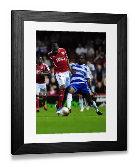 Framed Print : Bristol City vs. Reading: Marvin Elliott vs. Mikele Leigertwood Battle for Ball in Championship Match, September 2011 Framed Print : Bristol City vs. Reading: Marvin Elliott vs. Mikele Leigertwood Battle for Ball in Championship Match, September 2011