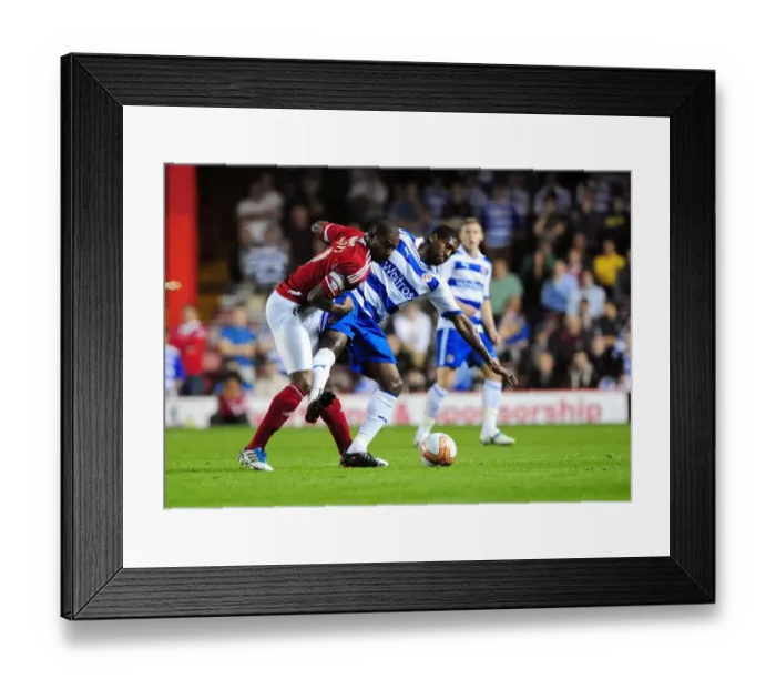 Framed Print : Championship Showdown: Elliott vs. Leigertwood - September 2011 - Marvin Elliott of Bristol City and Mikele Leigertwood of Reading Go Head-to-Head