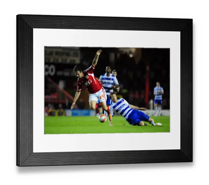 Framed Print : Bristol City's Brett Pitman Fouls by Kaspars Gorkss in Championship Match vs. Reading (September 27, 2011) Framed Print : Bristol City's Brett Pitman Fouls by Kaspars Gorkss in Championship Match vs. Reading (September 27, 2011)