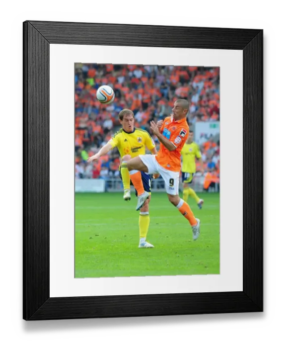 Framed Print : Neil Kilkenny vs. Kevin Phillips: Intense Battle in Blackpool v Bristol City League Cup Match - October 1, 2011 Framed Print : Neil Kilkenny vs. Kevin Phillips: Intense Battle in Blackpool v Bristol City League Cup Match - October 1, 2011