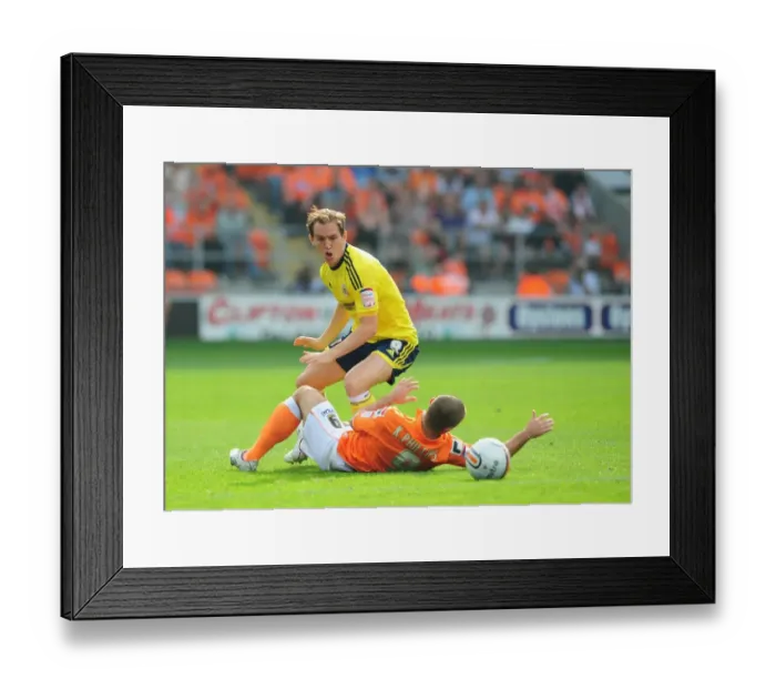 Framed Print : Intense Rivalry: Neil Kilkenny vs. Kevin Phillips - October 1, 2011 League Cup Clash at Blackpool Framed Print : Intense Rivalry: Neil Kilkenny vs. Kevin Phillips - October 1, 2011 League Cup Clash at Blackpool