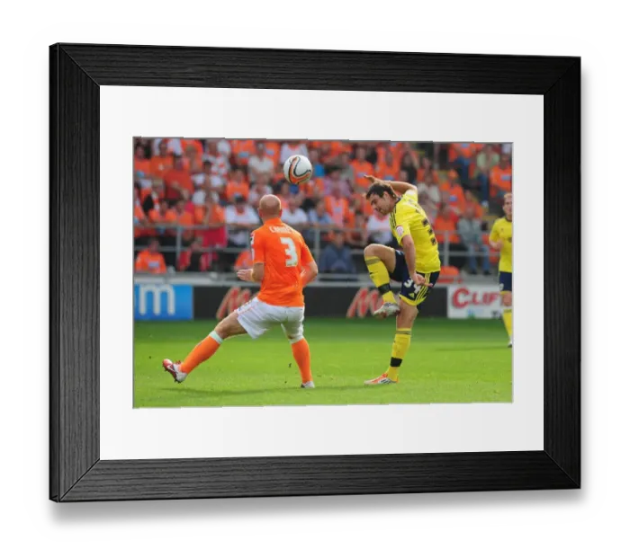 Framed Print : Brett Pitman Lifts Ball Over Stephen Crainey: Blackpool vs. Bristol City, League Cup 2011 Framed Print : Brett Pitman Lifts Ball Over Stephen Crainey: Blackpool vs. Bristol City, League Cup 2011
