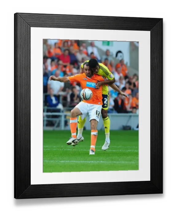 Framed Print : Jordan Spence vs Gary Taylor-Fletcher: Intense Battle in Blackpool v Bristol City League Cup Match, 01 / 10 / 2011