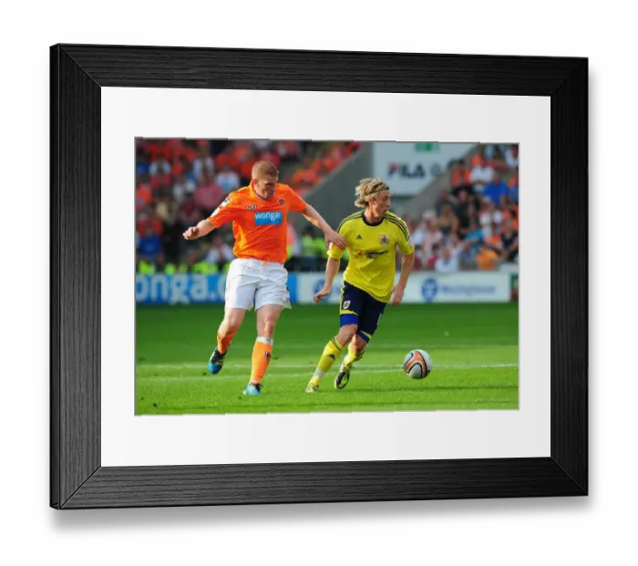 Framed Print : Martyn Woolford Advances Ball in League Cup Match: Bristol City vs. Blackpool (1st October 2011) Framed Print : Martyn Woolford Advances Ball in League Cup Match: Bristol City vs. Blackpool (1st October 2011)