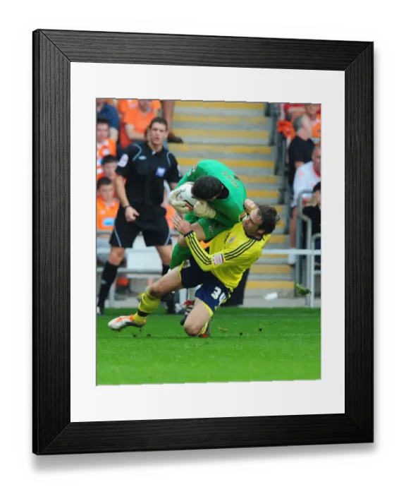 Framed Print : Brett Pitman's Forceful Challenge on Matthew Gilks during Blackpool vs. Bristol City League Cup Match, October 1st, 2011