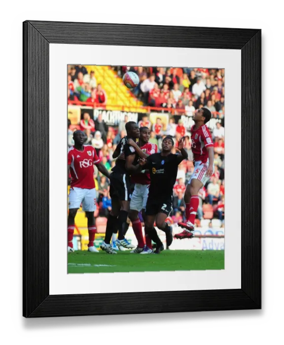 Framed Print : Bristol City's Lewin Nyatanga Narrowly Misses Header Goal Against Peterborough United - Championship Match, October 15, 2011