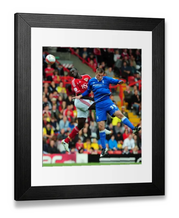 Framed Print : Intense High Ball Battle: Damion Stewart vs Chris Wood - Championship Match, Bristol City vs Birmingham City, Ashton Gate Stadium, 23rd October 2011 Framed Print : Intense High Ball Battle: Damion Stewart vs Chris Wood - Championship Match, Bristol City vs Birmingham City, Ashton Gate Stadium, 23rd October 2011