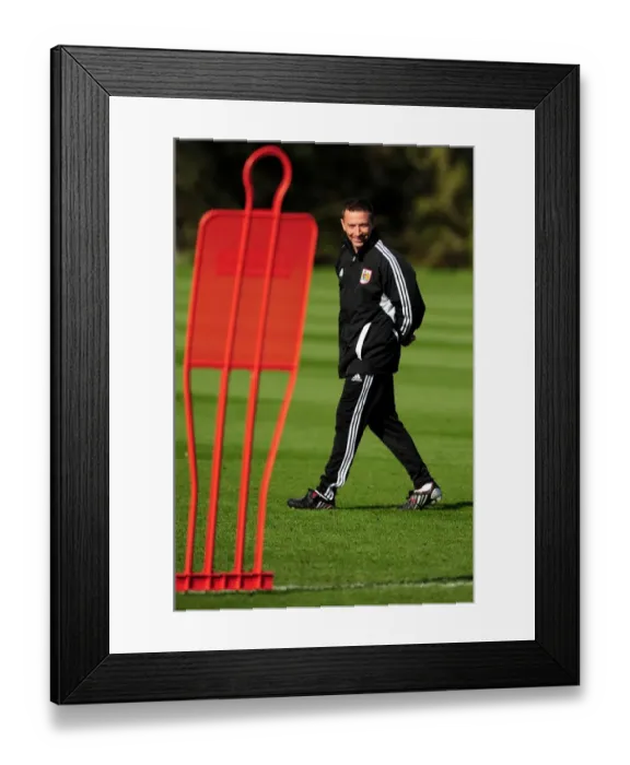 Framed Print : Championship Showdown: Derek McInnes and Unnamed Rival Team Clash at Ashton Gate - October 20, 2011