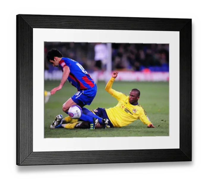 Framed Print : Championship Showdown: Cisse vs Jedinak - Tackle Battle at Selhurst Park (15 / 10 / 2011)