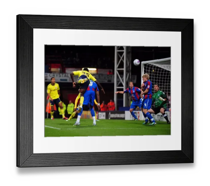 Framed Print : Damion Stewart's Headed Effort for Bristol City vs. Crystal Palace - Championship Match, October 15, 2011