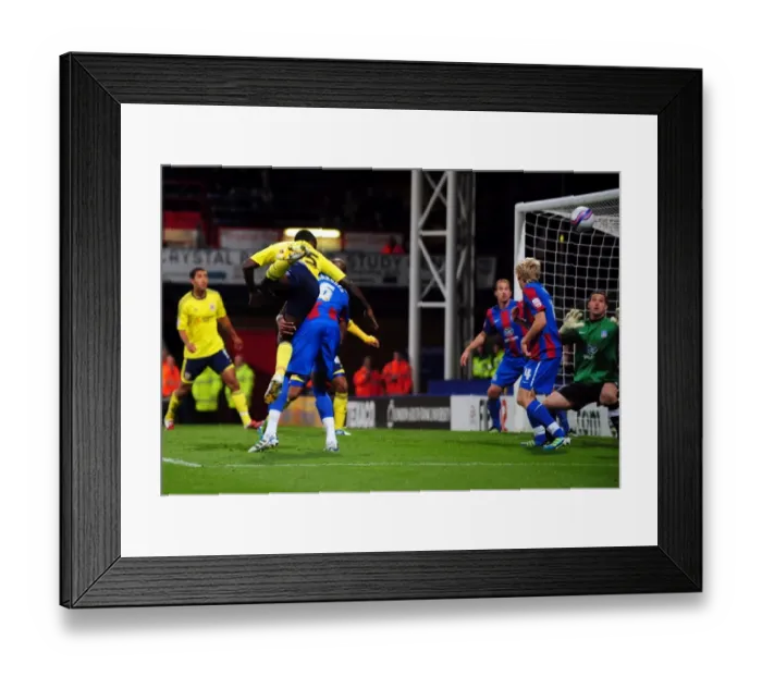 Framed Print : Damion Stewart's Headed Effort for Bristol City Against Crystal Palace in Championship Match, October 15, 2011 - Editorial Use Only