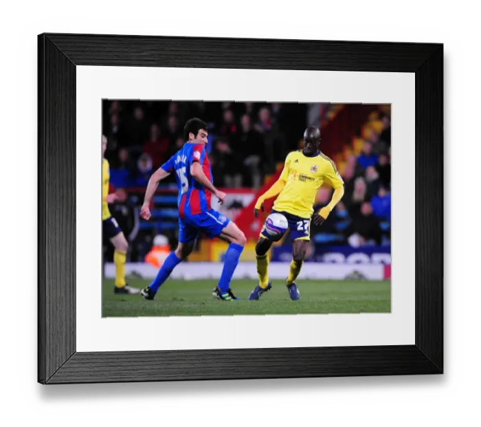 Framed Print : Adomah vs Jedinak: Intense Battle in Championship Match between Crystal Palace and Bristol City - 15 / 10 / 2011