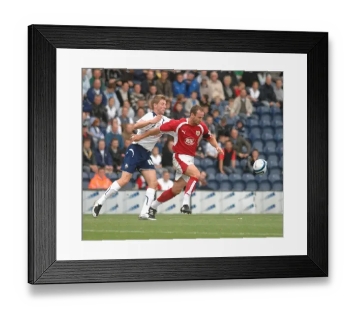 Framed Print : Bristol City Rivalry: Carey vs. Carter - A Battle for the Ball Framed Print : Bristol City Rivalry: Carey vs. Carter - A Battle for the Ball
