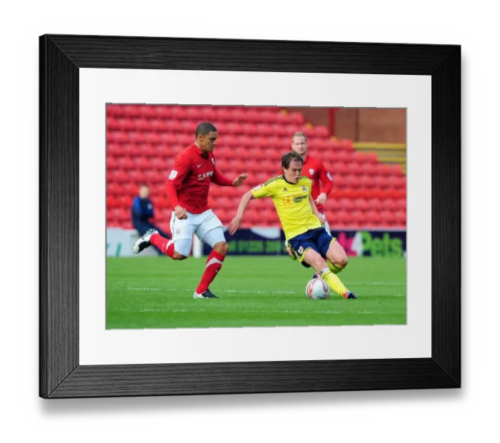 Framed Print : Neil Kilkenny vs. Nathan Doyle: Battle for the Ball in Barnsley v Bristol City Championship Match, October 2011 Framed Print : Neil Kilkenny vs. Nathan Doyle: Battle for the Ball in Barnsley v Bristol City Championship Match, October 2011
