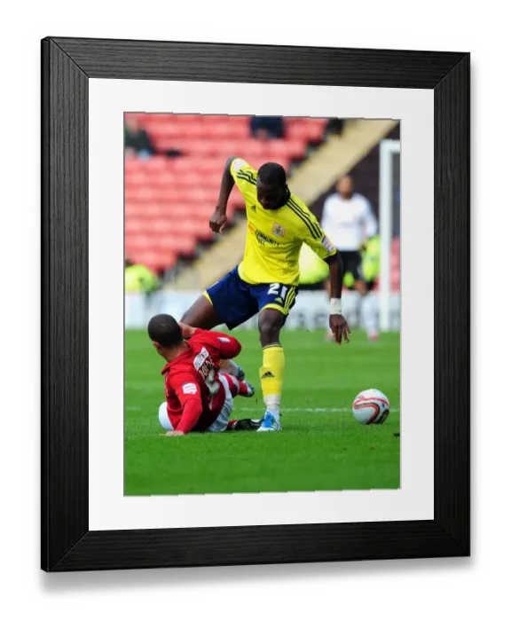 Framed Print : Barnsley vs. Bristol City: Kalifa Cisse vs. Nathan Doyle Battle for Possession in Championship Match, October 2011 Framed Print : Barnsley vs. Bristol City: Kalifa Cisse vs. Nathan Doyle Battle for Possession in Championship Match, October 2011