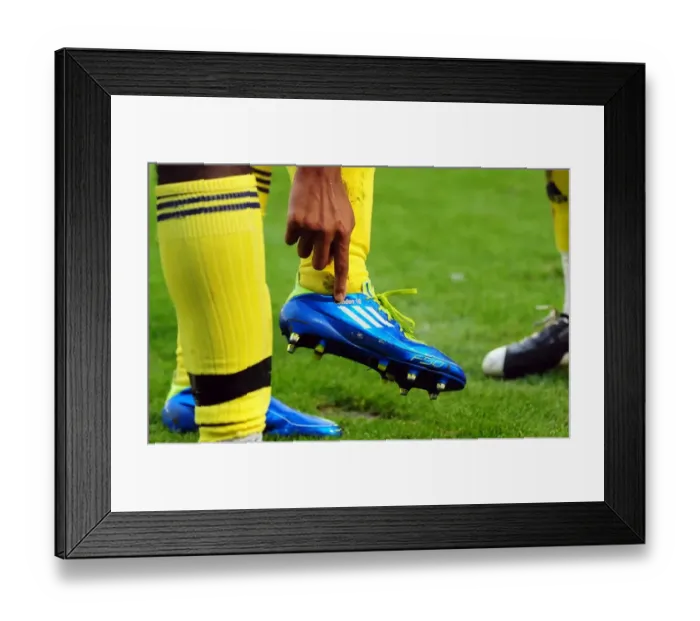 Framed Print : Nicky Maynard's Emotional Championship-Winning Goal for Bristol City: Honoring His Son Camden at Oakwell Stadium (2011) Framed Print : Nicky Maynard's Emotional Championship-Winning Goal for Bristol City: Honoring His Son Camden at Oakwell Stadium (2011)