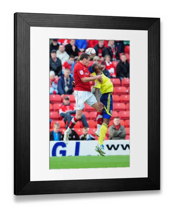 Framed Print : Battling for Championship Supremacy: Marvin Elliott vs. Nathan Doyle (Barnsley vs. Bristol City, 2011) Framed Print : Battling for Championship Supremacy: Marvin Elliott vs. Nathan Doyle (Barnsley vs. Bristol City, 2011)