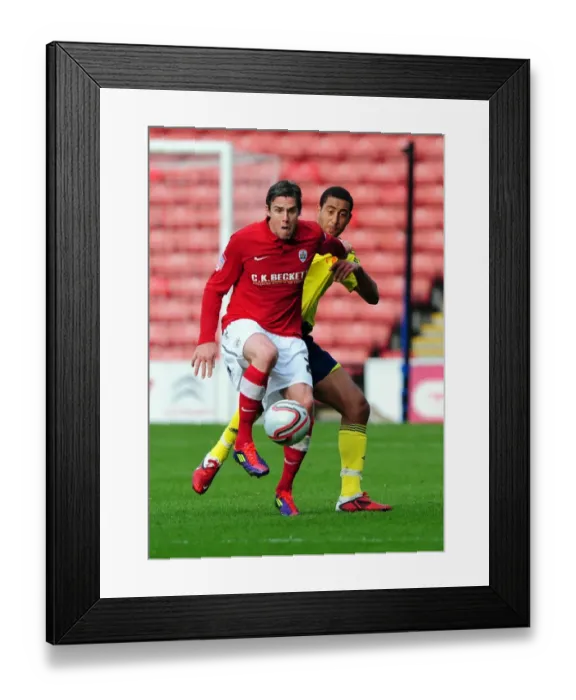 Framed Print : Barnsley vs. Bristol City Championship Clash: Nyatanga vs. Gray Heading Battle, October 2011 Framed Print : Barnsley vs. Bristol City Championship Clash: Nyatanga vs. Gray Heading Battle, October 2011