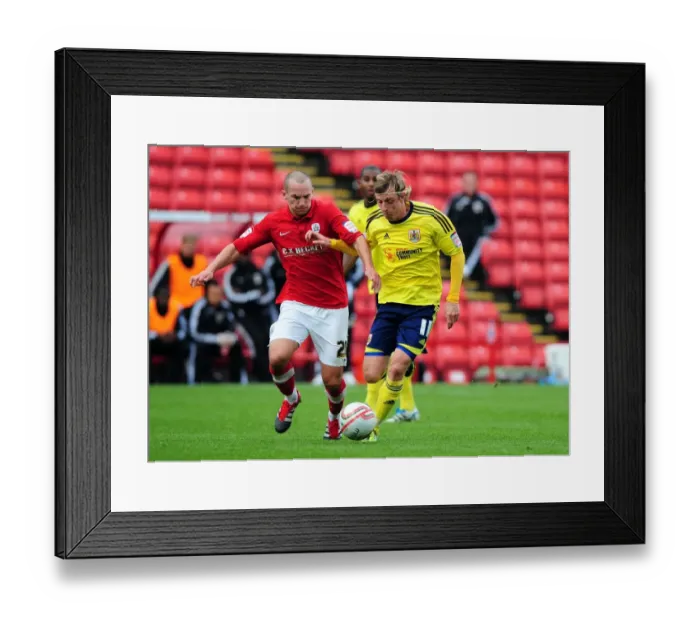 Framed Print : Battling Midfielders: Woolford vs Drinkwater in Barnsley vs Bristol City Championship Clash, 2011 Framed Print : Battling Midfielders: Woolford vs Drinkwater in Barnsley vs Bristol City Championship Clash, 2011