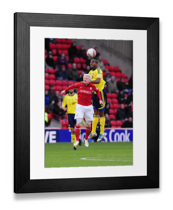 Framed Print : Championship Showdown: Marvin Elliott vs. David Perkins - Bristol City vs. Barnsley, 2011