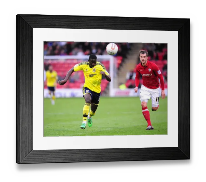 Framed Print : Bolasie vs. Wiseman: Intense Rivalry in Barnsley vs. Bristol City Championship Clash, October 2011 Framed Print : Bolasie vs. Wiseman: Intense Rivalry in Barnsley vs. Bristol City Championship Clash, October 2011