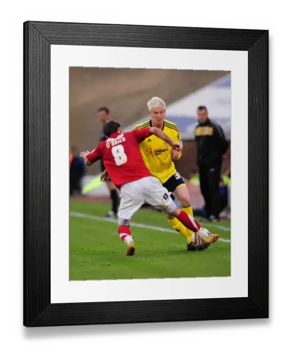 Framed Print : Battling for Supremacy: McGivern vs. O'Brien in Championship Clash between Barnsley and Bristol City Framed Print : Battling for Supremacy: McGivern vs. O'Brien in Championship Clash between Barnsley and Bristol City