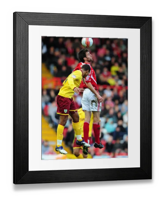 Framed Print : Bristol City vs Burnley: Cole Skuse vs Junior Stanislas Battle for High Ball - Championship Match, 05 / 11 / 2011 - Editorial Use Only Framed Print : Bristol City vs Burnley: Cole Skuse vs Junior Stanislas Battle for High Ball - Championship Match, 05 / 11 / 2011 - Editorial Use Only